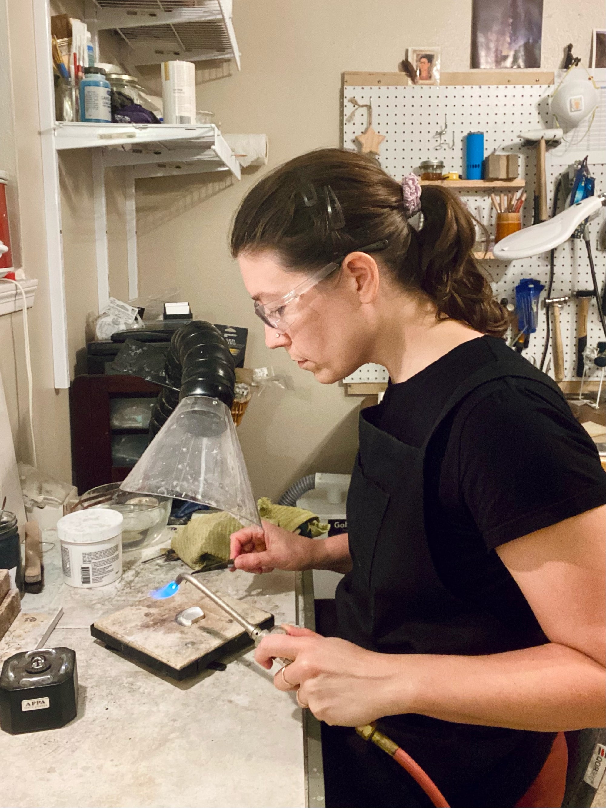 Lindsey working at her soldering station